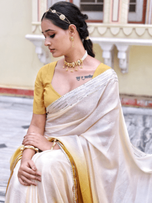 Golden Aura Ombre Saree with Semi-Stitched Blouse, The saree has a beautiful aumbre style tie -dye pattern, The hemline of the saree has a lovely lace detailing.